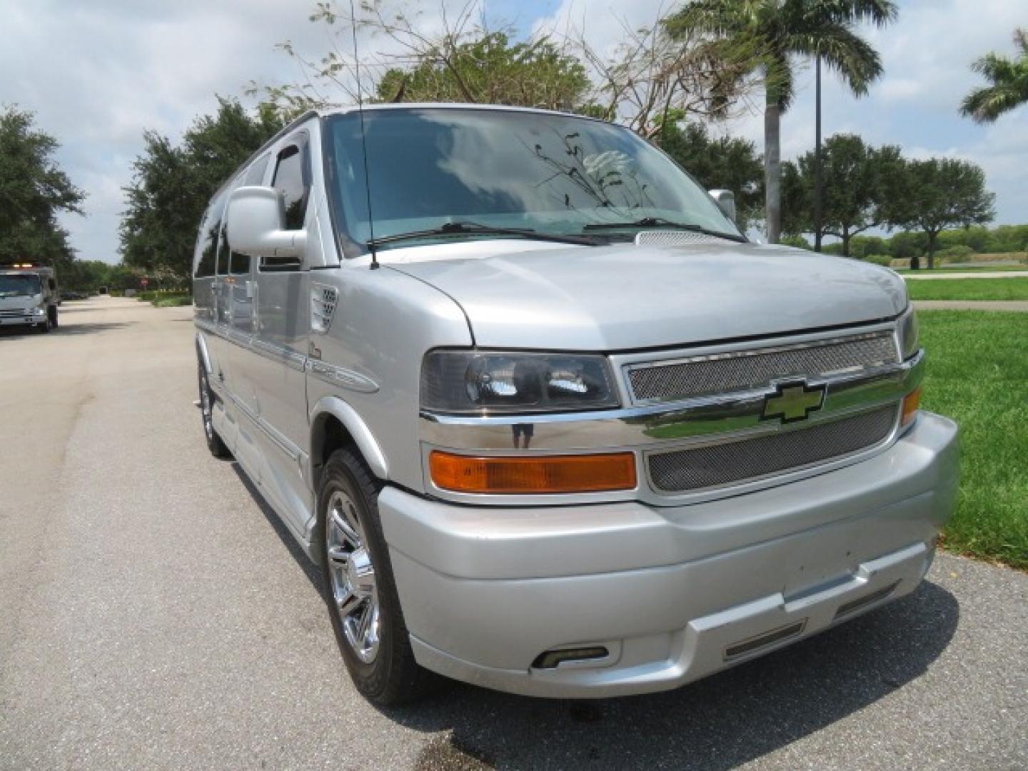 2014 Chevrolet Express (1GBWGLCG3E1) , located at 4301 Oak Circle #19, Boca Raton, FL, 33431, (954) 561-2499, 26.388861, -80.084038 - You are looking at a Rare 2014 Chevy Express 2500 Quigley 4x4 Four Wheel Drive Explorer Limited SE 9 Passenger Conversion Van with: 107K Original Miles, 6 Captain Chairs, Rear Power Folding Bench Seat Bed, Center Consoler Cooler, Front PPF (Paint Protection Film) Explorer Limited Conversion Througho - Photo#10